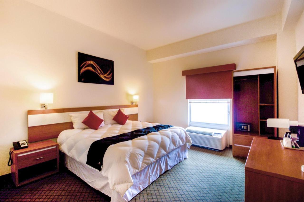 Capital O Hotel Herederos, Piedras Negras Buitenkant foto