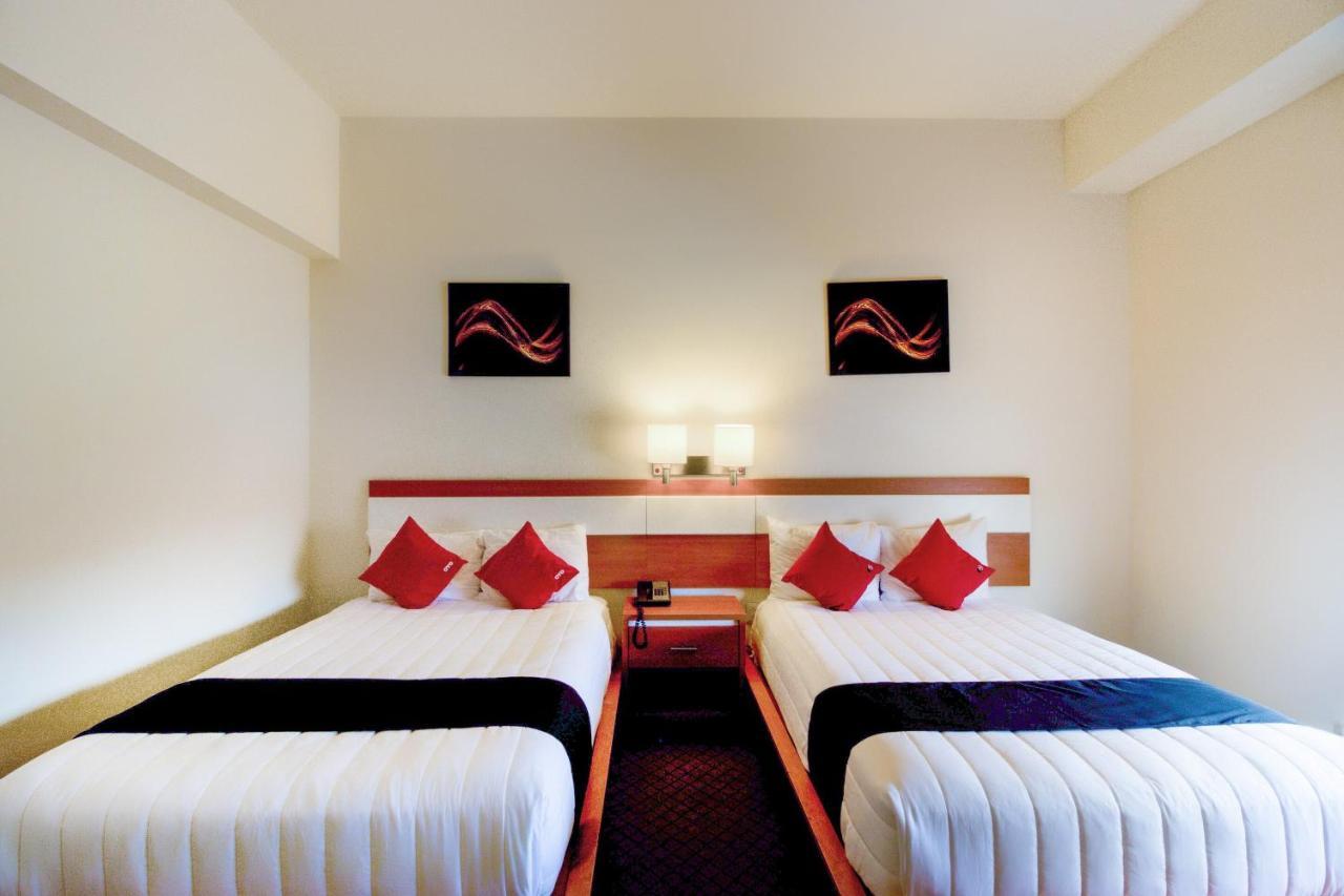 Capital O Hotel Herederos, Piedras Negras Buitenkant foto