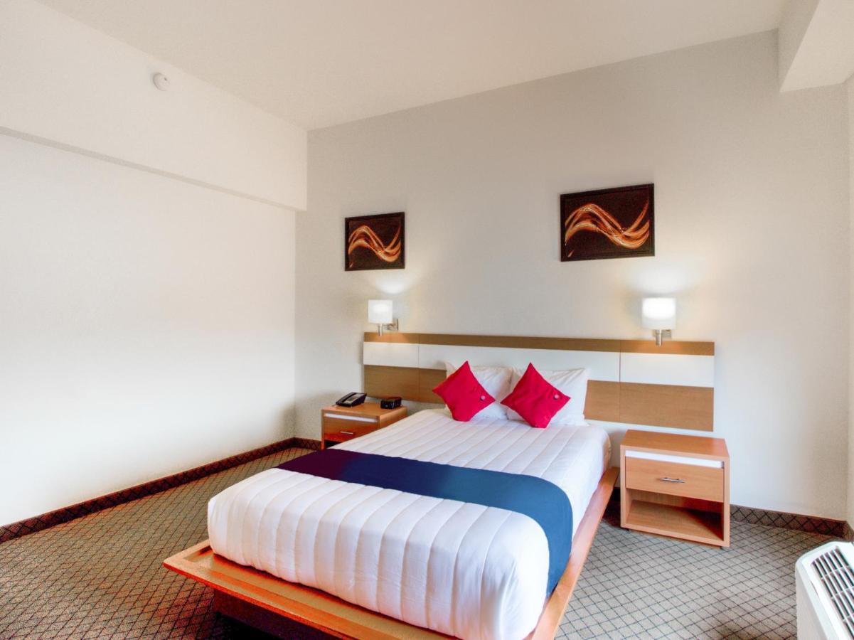 Capital O Hotel Herederos, Piedras Negras Buitenkant foto